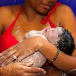 Pregnant woman outdoors in heat