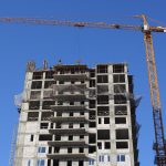 New market-rate apartment building under construction in an urban neighbourhood