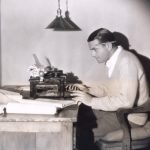 Worker experiencing AI fatigue at a computer